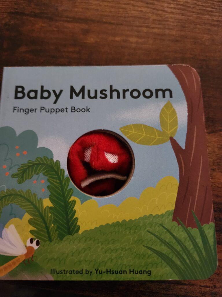 Christmas Gift Guide 23:                  Baby Mushroom Finger Puppet Book Illustrated by Yu-Hsuan Huang from Chronicle Kids. 